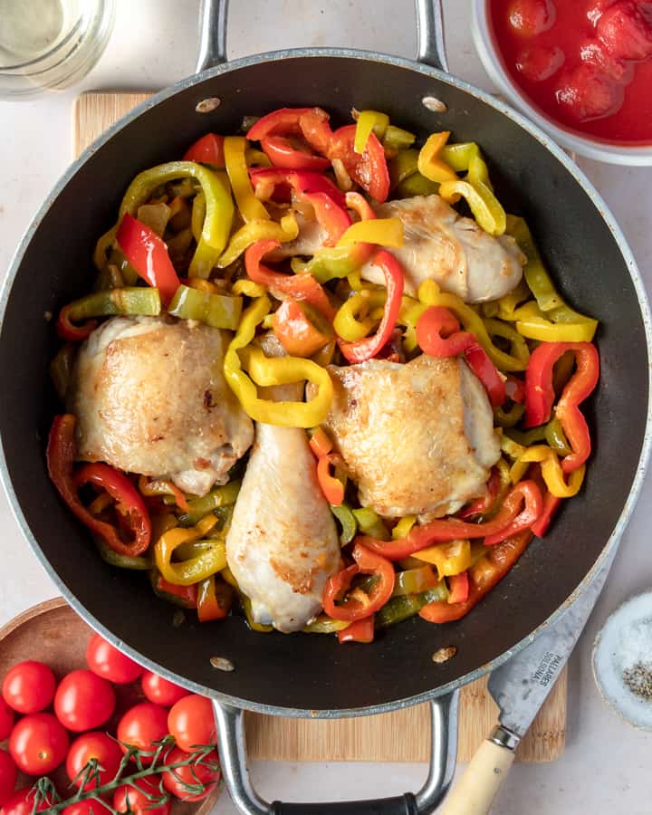 Chicken and peppers on a pan