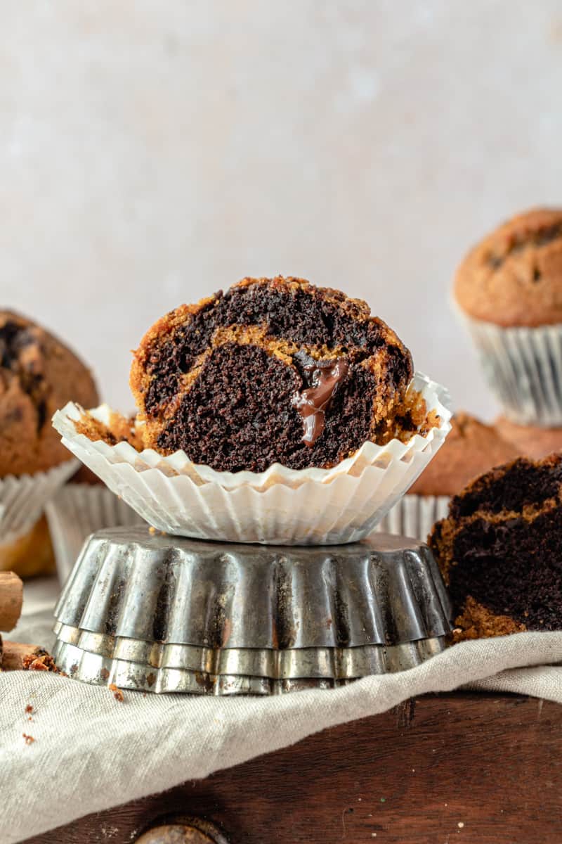 Halved muffin with melted chocolate