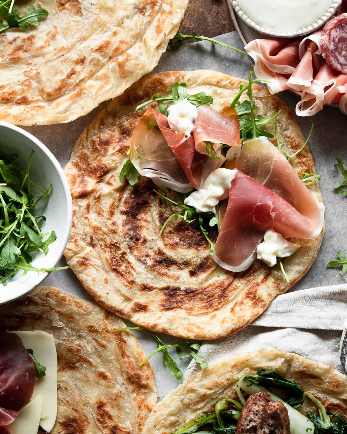 Italian flatbread with cured meat and veg
