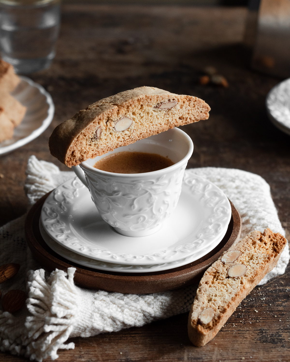 Italian almond biscotti recipe set on a cup of coffee