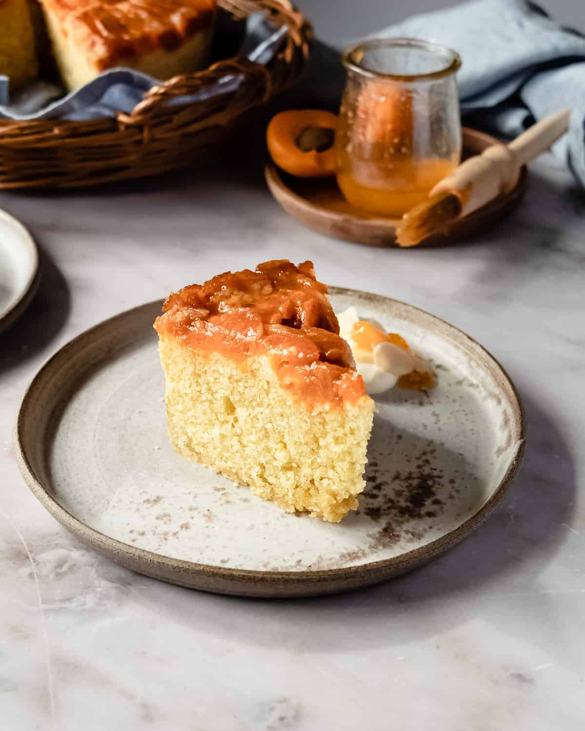 Slice of Italian almond cake on cake plate.