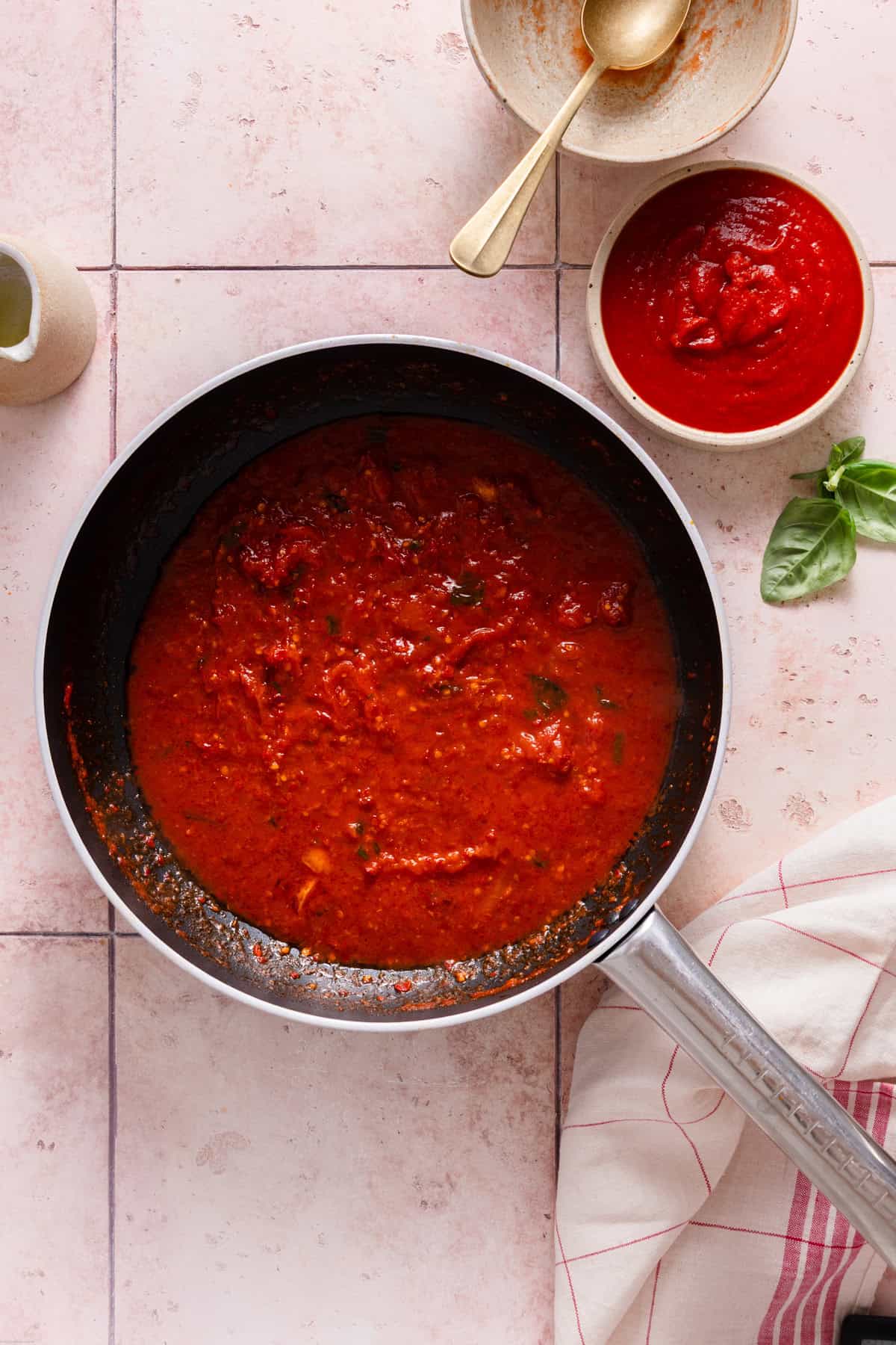 tomatoes sauce with nduja on a saucepan